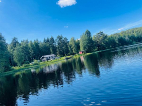 Stuga med strandtomt i Smålands natursköna miljö